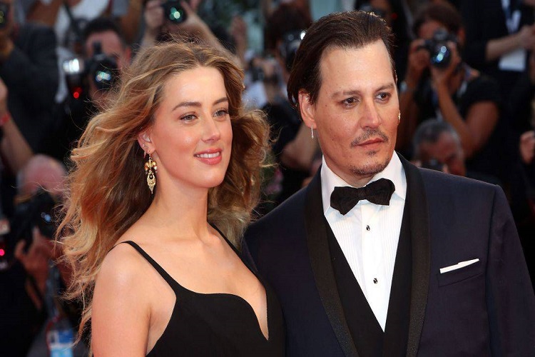 Amber Heard paga un millón de dólares a Depp un año después del juicio
