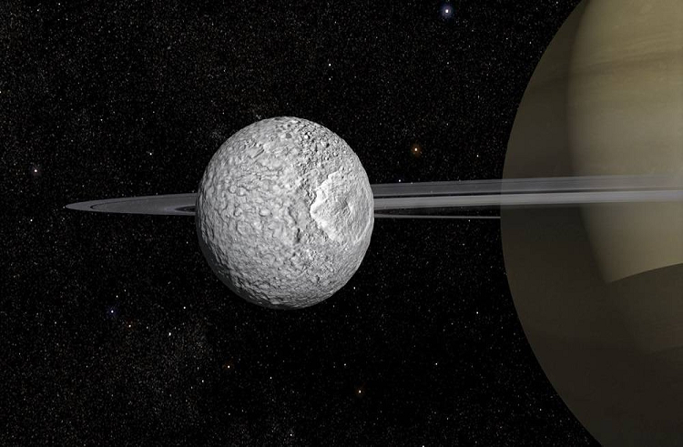 La luna de Saturno, que parece una estrella de la muerte, puede tener un vasto océano subterráneo